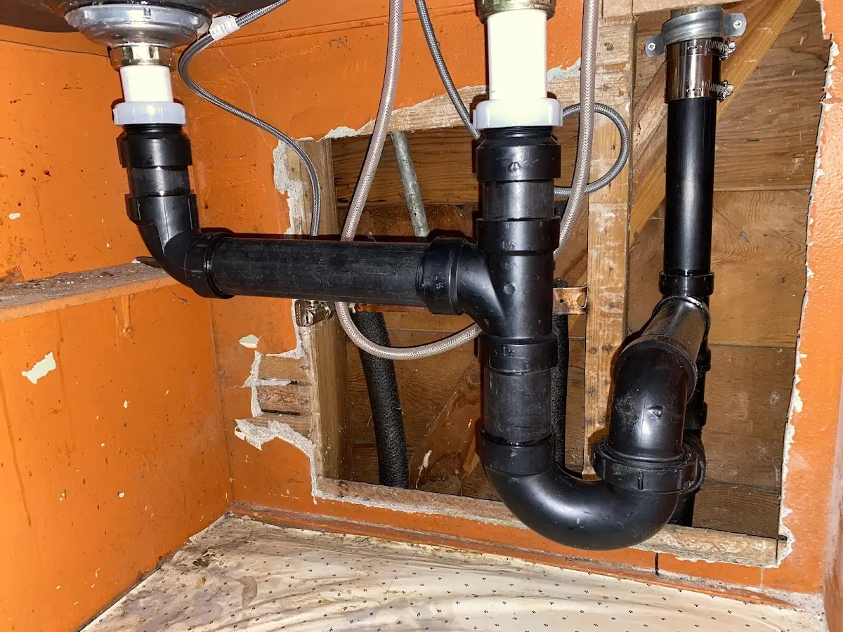 Professional Garbage Disposal Repair equipment and tools on the job in Lubbock